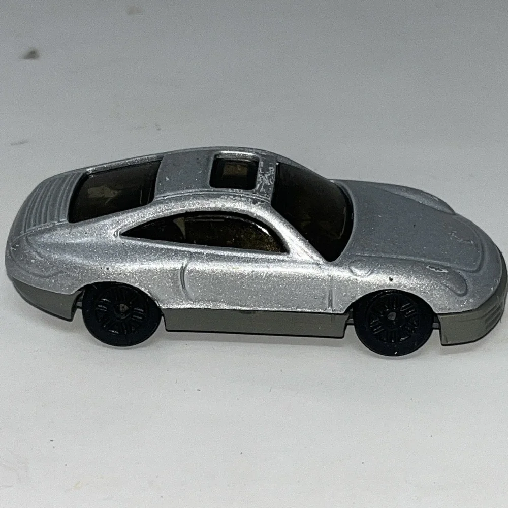 unbranded diecast made in China silver porsche